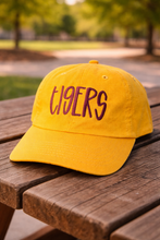 Load image into Gallery viewer, Gold Tigers hat with maroon embroidery on wooden table
