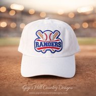 Texas Rangers inspired embroidered baseball hat on a blurred stadium background with warm lighting, unisex game day cap.