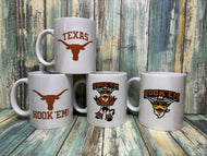 Texas Longhorns coffee mugs with Hook Em design and Longhorn logo in burnt orange on white ceramic mugs