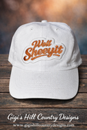 White unstructured dad hat with Well Sheeyit embroidered patch on front, casual western style cap